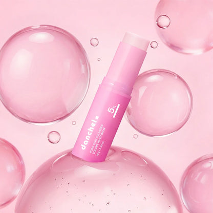 Pink skincare product with bubbles on a pink background